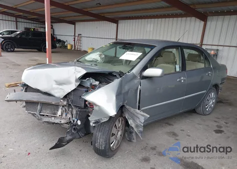 2003 Toyota Corolla Le z USA, uszkodzony, nr VIN JTDBR32E030036896